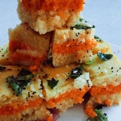 A picture of Sago, fox nuts and samak rice sandwich dhokla.