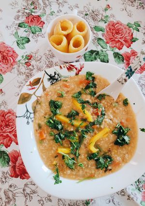 A picture of Oats masala veggie soup.