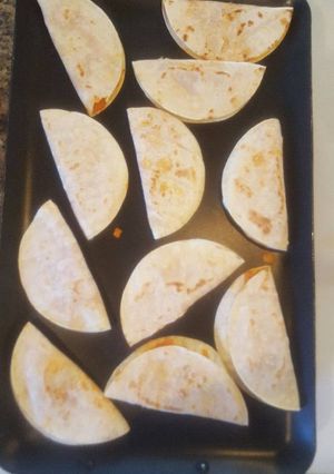 Una foto de Tacos de papas adobadas