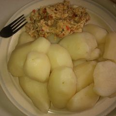 A picture of Boiled Irish potatoes and fried egg.