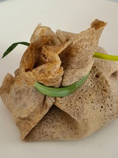 Une photo de Aumônière de galette poireau st jacques