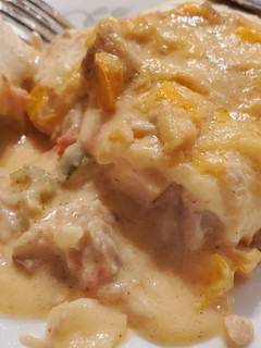 A picture of Chicken Enchiladas.