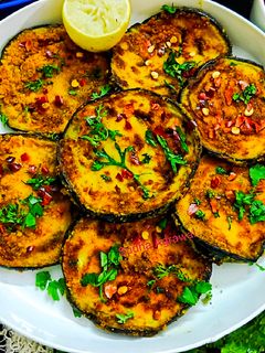 बैंगन भाजा (Baigan Bhaja recipe in Hindi) रेसिपी मुख्य फोटो