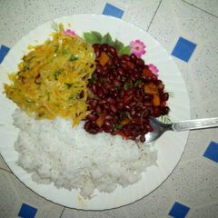 Boiled Rice with bean stew and fried cabbage A picture of Boiled Rice with bean stew and fried cabbage.