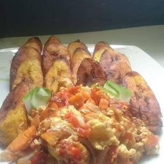 Fried plantain with fried eggs A picture of Fried plantain with fried eggs.