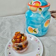 A picture of #mania# Recipe's name-Andhra style Lehsuni Mango Pickle.