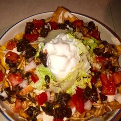 A picture of Chicken enchilada nachos.