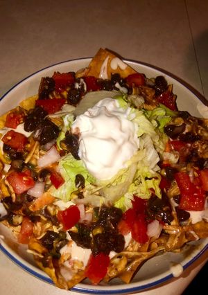 A picture of Chicken enchilada nachos.