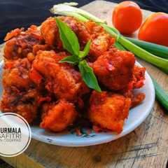 A picture of Spicy chicken popcorn.