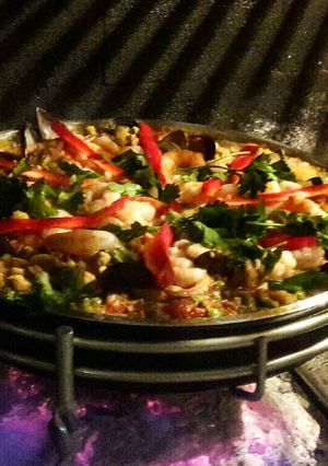 Una foto de Paella al disco
