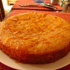 A picture of Bitter Orange Cake with orange caramel drizzle.