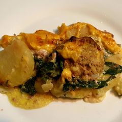 A picture of Cheesy Spinach, Meatball & Potato Bake.