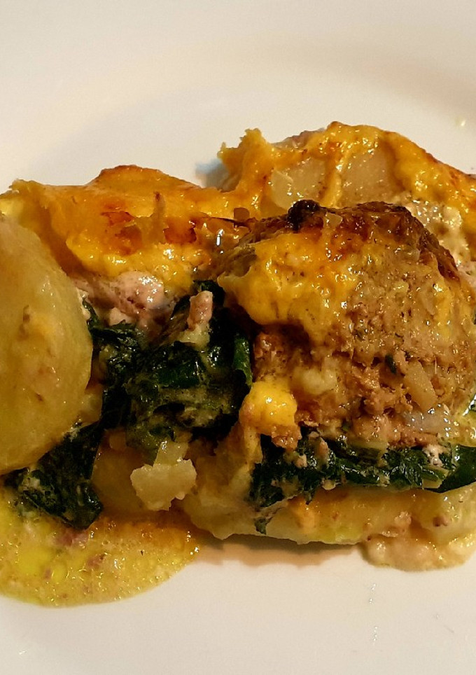 A picture of Cheesy Spinach, Meatball & Potato Bake.