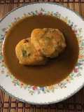 Tortitas de calabacitas con mole de masa