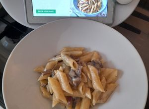 Foto di Pennette risottate con funghi e speck