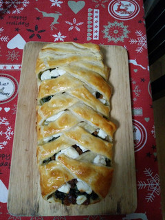 Una foto de Trenza de espinacas con queso de cabra