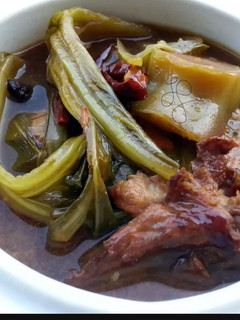 A picture of Leftover Meat With Mustard Green Stew / CHAI BUEY.