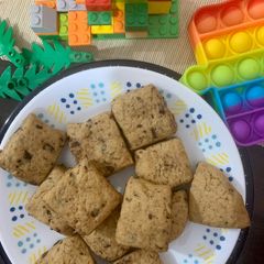 A picture of Square milk choco cookies in a cookie dough batter.