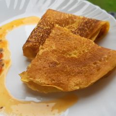 A picture of Besan cheela with tamater chutney.