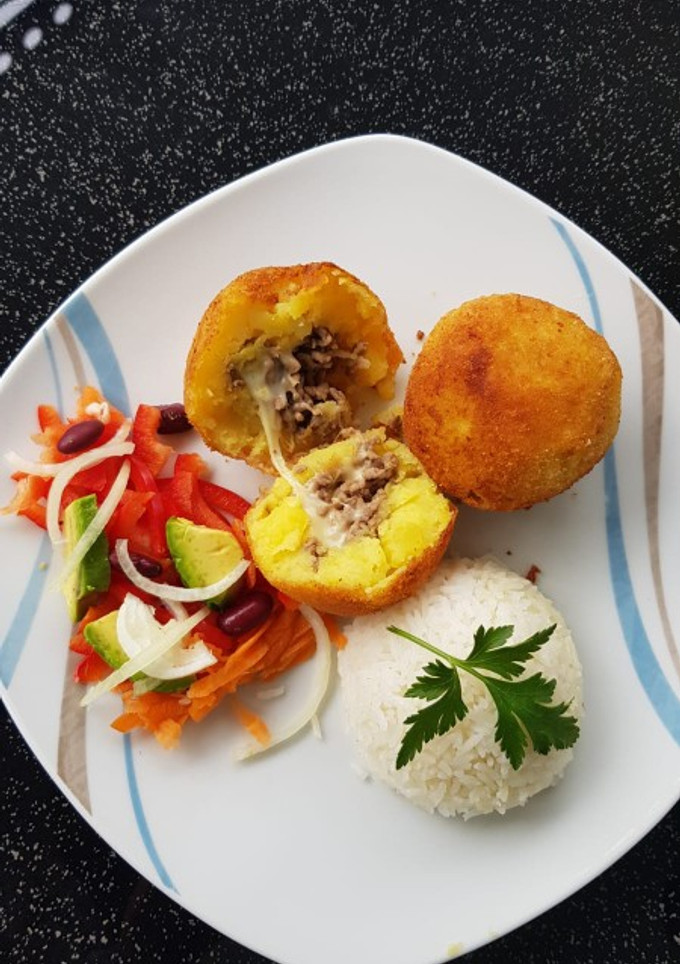 Una foto de Papas/ patatas rellenas