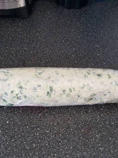 A picture of Blue cheese chive butter log.
