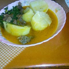 Stewed potatoes with meat and kales A picture of Stewed potatoes with meat and kales.