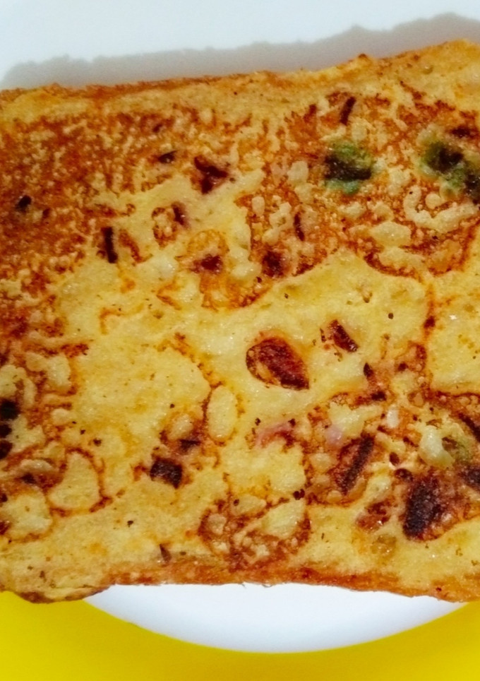 A picture of Bread toast with besan batter.