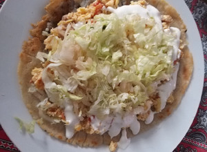 Una foto de Desayuno de campeones 1.8 Huaraches redondos con huevo revuelto