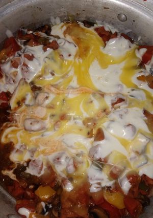 Una foto de Alambre de salchichas para asar con queso
