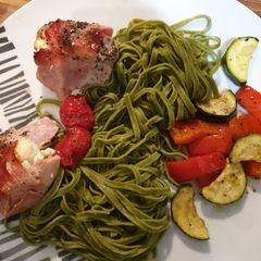 A picture of Baked garlic chicken with roasted veg and linguine.