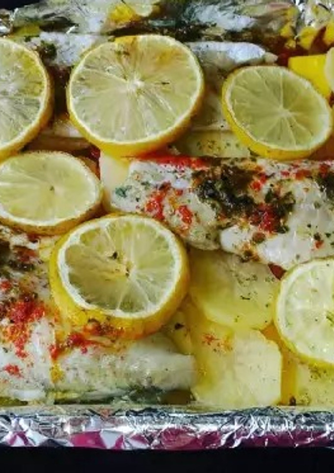 Una foto de Pescado al horno con verduras