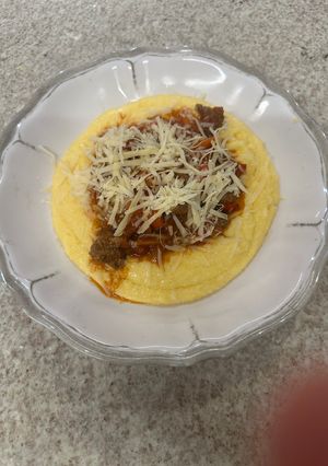 Una foto de Polenta con Carne