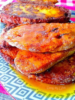 Una foto de Torrijas glaseadas de clementinas confitadas de alexis Urrutia