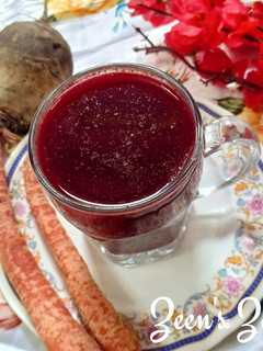 A picture of Orange Beetroot and Carrot Juice.