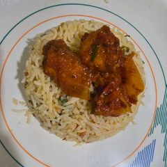 A picture of Fried rice with paneer schezwan.