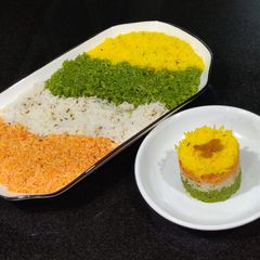 A picture of Rainbow pulao jain with natural colors.