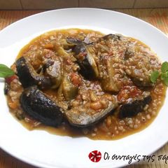 A picture of Eggplants with xynohondro (sour chunk) trahana.