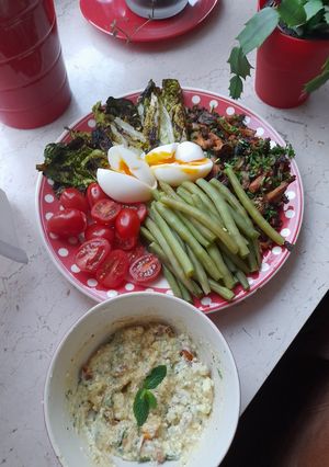 A picture of Mixed veg with feta cream and boiled eggs.