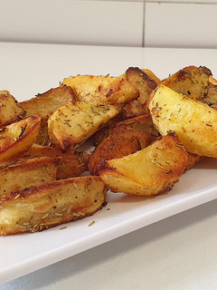 Una foto de Patatas al romero
