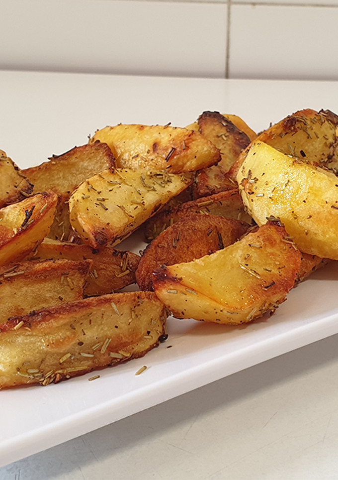 Una foto de Patatas al romero