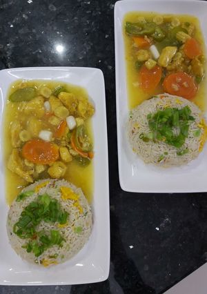 A picture of Chicken chilli with lots of vegies and fried rice for 2.