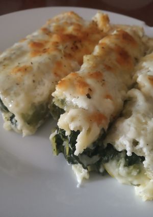 Una foto de Canelones de espinacas