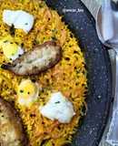 Arroz con cebolla, bacalao, boquerones y huevos de codorniz