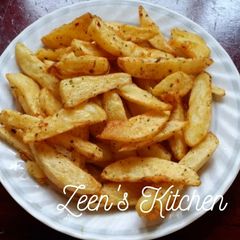 A picture of Potato Wedges with Herbs.