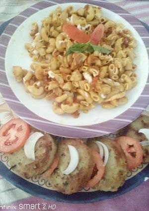 A picture of One pot macroni with chicken shami kababs.