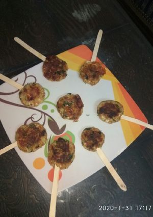 A picture of Crispy potato paneer cheesy lollipop.