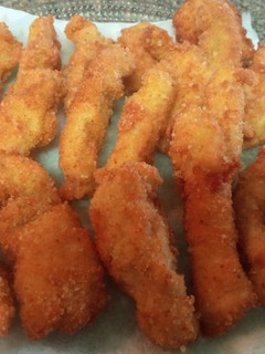 Una foto de Barritas de pollo a la parmesana