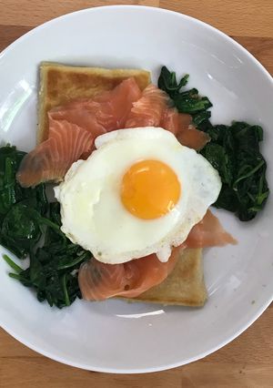 A picture of Potato farls with eggs, smoked salmon and spinach.