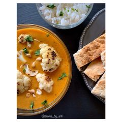 A picture of Charred cauliflower and toasted cashew vegan curry.