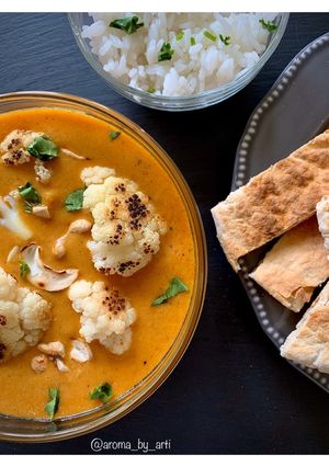 A picture of Charred cauliflower and toasted cashew vegan curry.